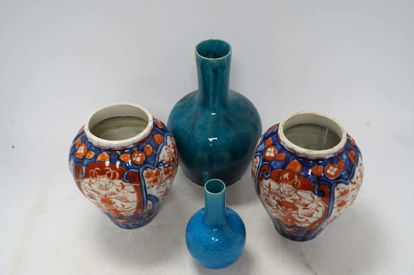 Two Japanese turquoise glazed vases and two Imari vases, tallest 21cm high (4). Condition - turquoise vases good, a chip to top edge of one Imari vase